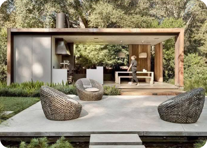 Modern outdoor living space with minimalist furniture and natural lighting