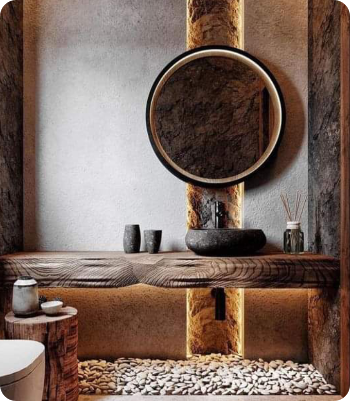 Bathroom vanity with round mirror, dark wood cabinetry and ambient lighting